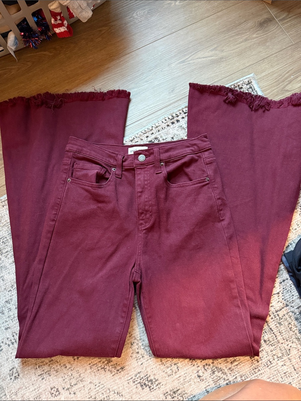 High-Rise flare-Leg Jeans in Deep Burgundy with Frayed Hem bells